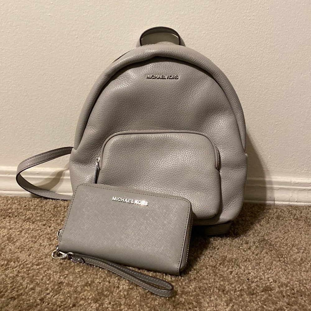 Gray Michael Kors bag and wallet. Barely used.